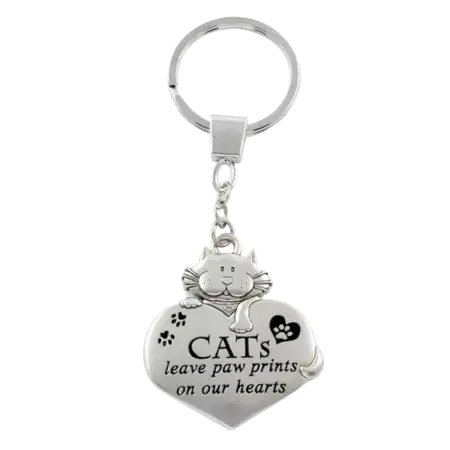 "Cats leave paw prints on our hearts " Keychain with Custom Engraving on the back buy at ThingsEngraved Canada